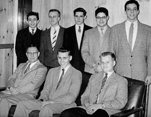 57-58 Photo Club: Standing: A. Herbert, Stidham, B. Davis, Woolweaver, Eglowsky.
Sitting: Mr. Pease, Kaucher, Martin